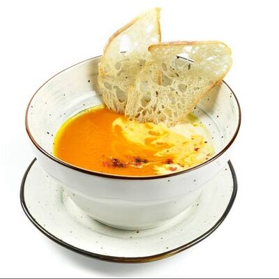 Крем-суп из тыквы на кокосовом молоке с креветками в Vibes Cafe по цене 570 ₽