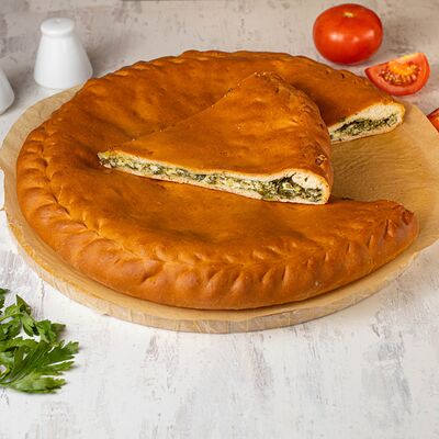 Осетинский пирог с сыром и зеленью в Хлебное место по цене 1100 ₽