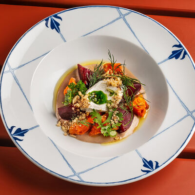 Салат из сезонной тыквы со свеклой в ткемали, ореховым кремом и взбитой фетой в Дзеими по цене 318 ₽