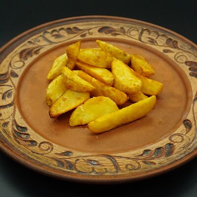 Картофель дольками фри в Избушка по цене 195 ₽