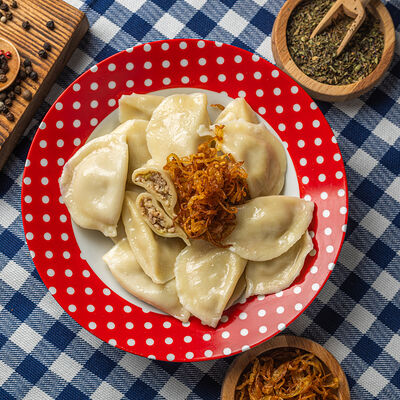 Вареники с капустой и жареной курицей в Вареничная №1 по цене 563 ₽