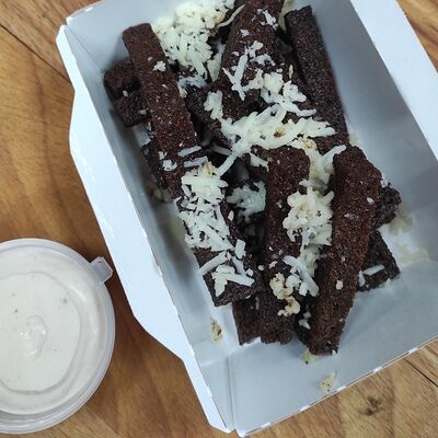 Гренки с чесноком и сыром в Панда Ok по цене 230 ₽