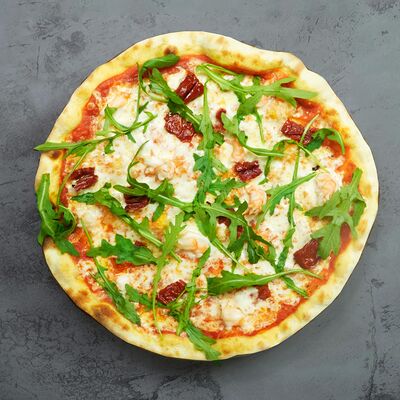 Пицца с креветками и вялеными томатами 30 см в Остерия Il Massimo по цене 1100 ₽