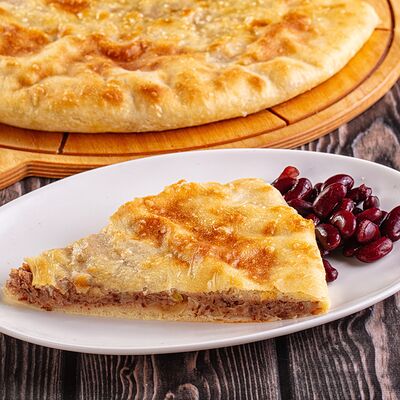 Пирог с фасольюв Осетинские Пироги по цене 1100 ₽