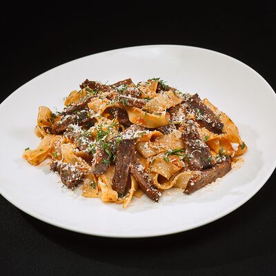 Паста с телячьей щекойв Harats Pub по цене 632 ₽