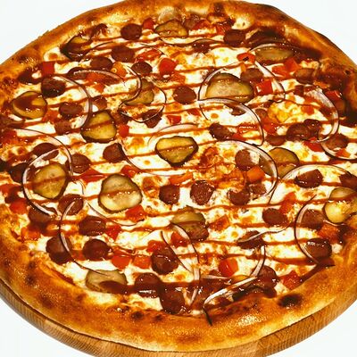 Пицца Охотничья в Добрая кухня по цене 699 ₽