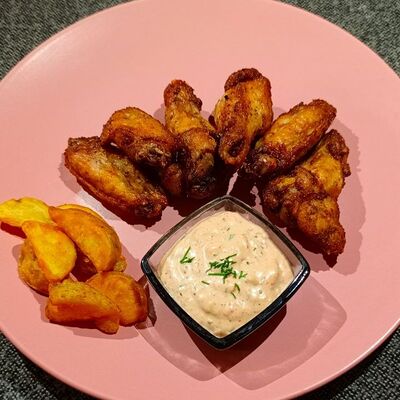 Острые крылышки с запеченным картофелем в Территория еды 59 по цене 565 ₽