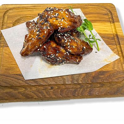 Куриные крылышки терияки в Мегаполис по цене 420 ₽