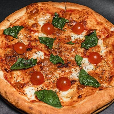 Пицца Маргарита в Рога Лося по цене 520 ₽