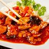 Курица с овощами в кисло-сладком соусе в iWok по цене 390