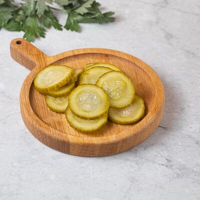 Огурцы маринованные в Хлебное место по цене 50 ₽