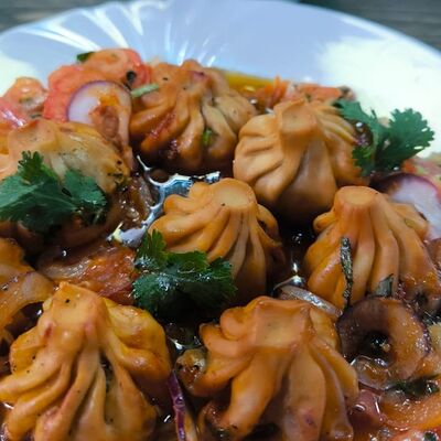 Патара, жаренная с овощами, с курицей в Хинкальная Едим вкусно по цене 600 ₽