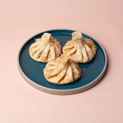 Обжаренные хинкали с бараниной и говядиной в Tbls по цене 115 ₽