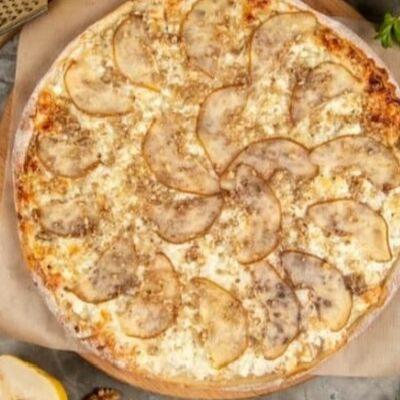 Пицца Дюшес на тонком тесте в Хомячок по цене 990 ₽