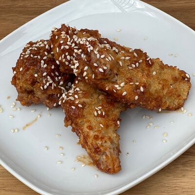 Куриные крылья в соусе в Собрание по цене 560 ₽