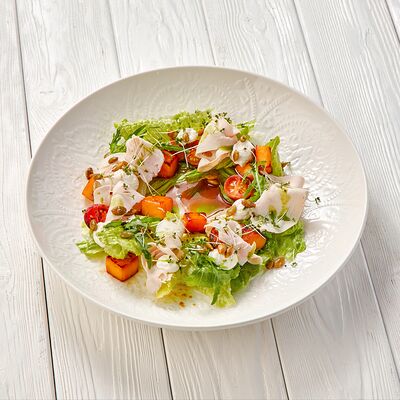 Салат с печеной тыквой в Пармезан по цене 595 ₽