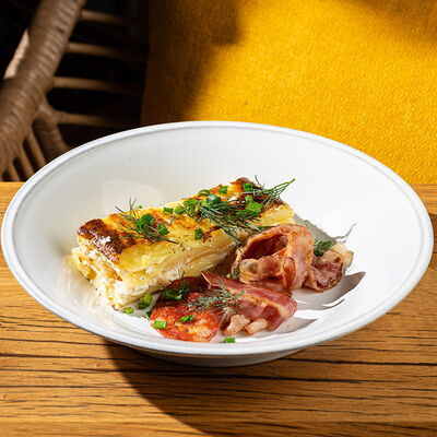 Картофельный гратен с беконом и чоризо в Сыроварня по цене 590 ₽