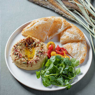 Хумус с вялеными помидорами и перцем в Чайхона №1 Васильчуки по цене 490 ₽