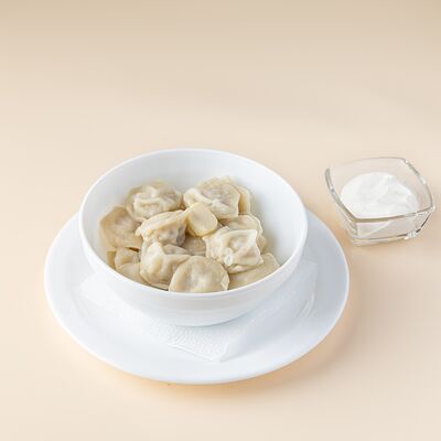 Пельмени домашние со сметаной в Шарики по цене 370 ₽