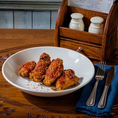 Хрустящие крылья в Big Jim’s Pub по цене 690 ₽