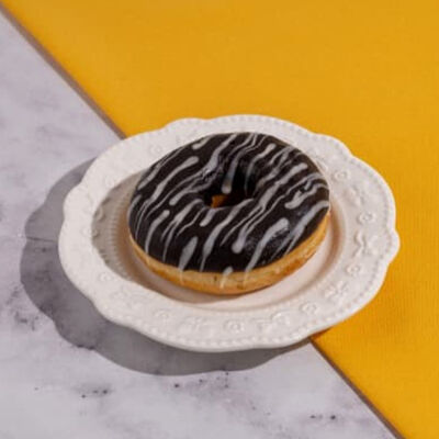 Донат с шоколадной начинкой в Пекарня Буханка по цене 139 ₽