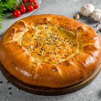 Пирог с курицей и сыром в Мельница & Гриль