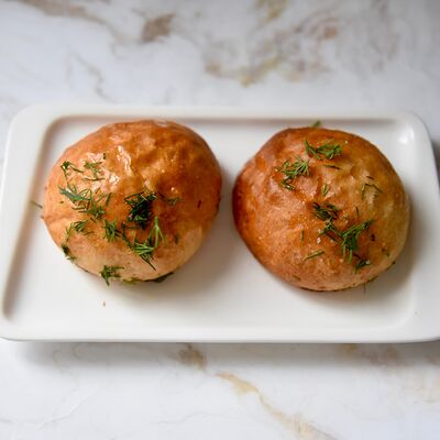 Пампушка с зеленью и чесноком в Сметана на Б. Садовой по цене 79 ₽