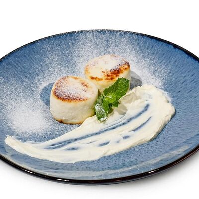 Сырники со сметаной в ЗАКАЗУУМ ZAKAZOOM по цене 304 ₽