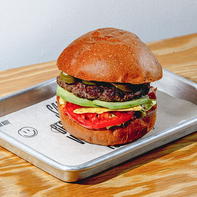 Мексиканский бургер в SALUT! по цене 620 ₽