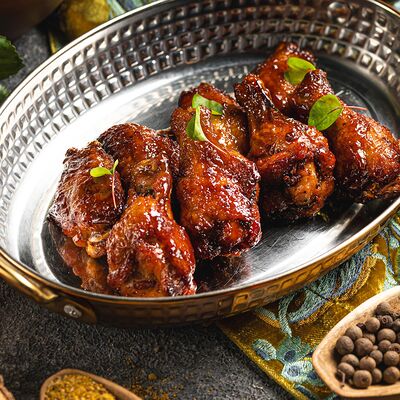 Куриные крылья в ароматной глазури в Алазани по цене 4200 ₸