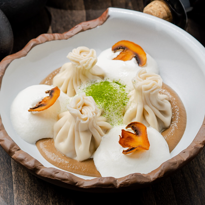 Хинкали с боровиками, картофелем, адыгейским сыром в Съели Сумели по цене 660 ₽