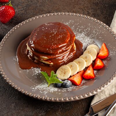Панкейки с ягодами и шоколадомв Tayami по цене 340 ₽