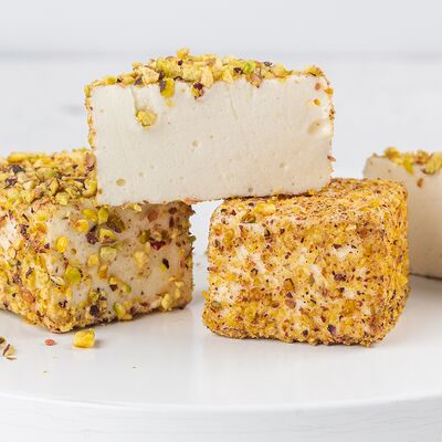 Пирожное Птичье молоко с фисташкой в Кулинарные истории по цене 170 ₽