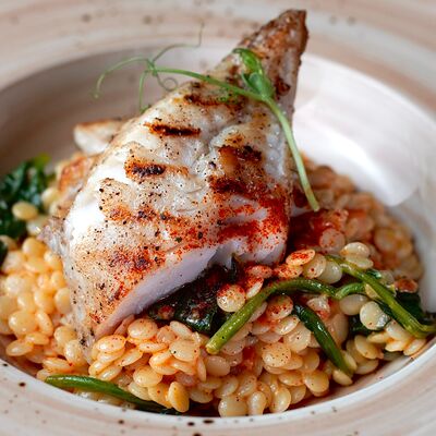 Филе окуня с птитимом и шпинатом в Рандеву по цене 730 ₽