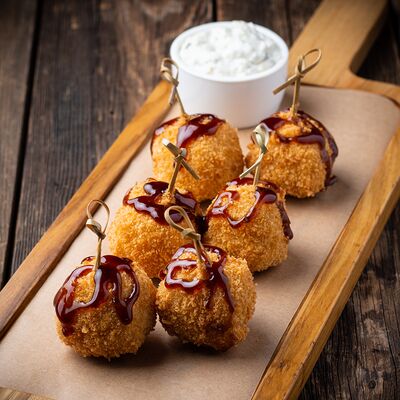 Нежный сыр в беконе в Pizza-Pub London по цене 560 ₽