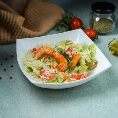 Салат Цезарь с креветками в Park cafe по цене 550 ₽
