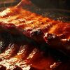 Свиные ребра гриль с соусом BBQ в PlutuS Resto Club по цене 750