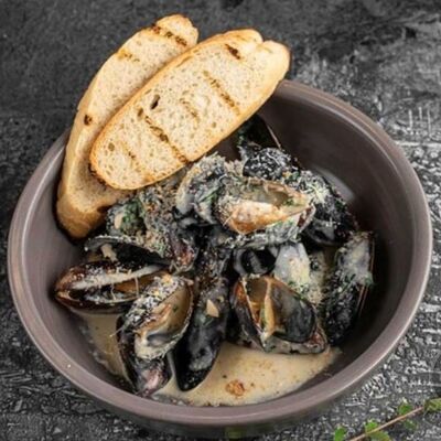 Мидии в сливочно-чесночном соусе в PANORAMA по цене 980 ₽