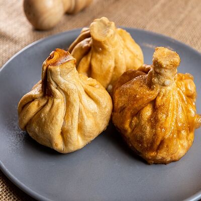 Хинкали жареные с говядиной и свининой 3 шт в Место про тесто по цене 255 ₽