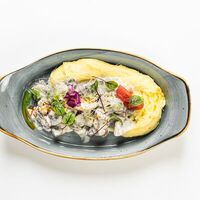 Телятина с шампиньонами под сливочным соусом в Aura Shubar
