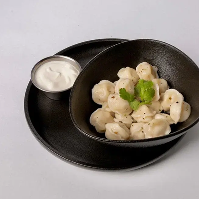 Пельмешки со сметаной в Мидийный дом по цене 350 ₽