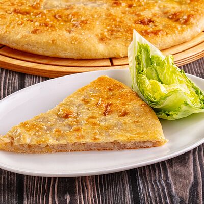 Осетинский пирог с капустой в Осетинские Пироги по цене 1100 ₽