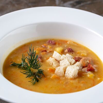 Гороховый суп с копченостями в Кристалл по цене 600 ₽