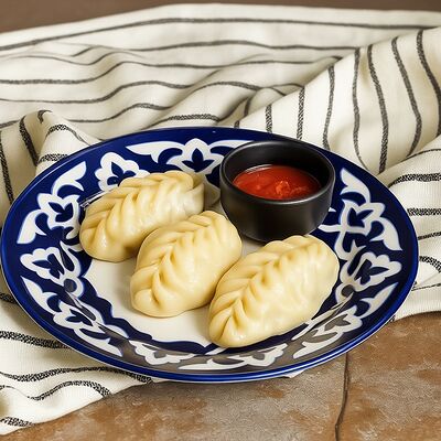 Манты с говядиной и тыквой в Пахлава по цене 390 ₽