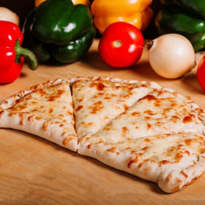 Кальцоне в Food74 Court Суши Пицца по цене 730 ₽