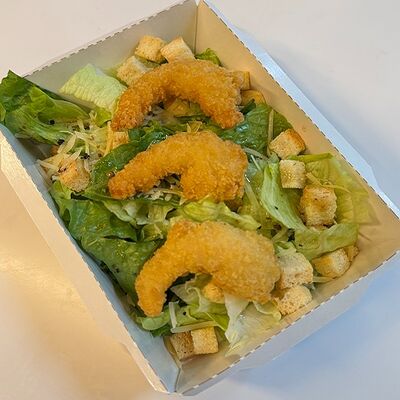 Салат Цезарь с креветками в Рент кафе по цене 480 ₽