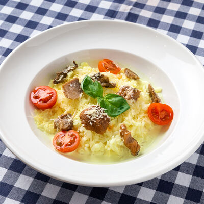 Ризотто с белыми грибами в Trattoria Caffe Del Sole по цене 380 ₽