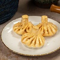 Жареные хинкали со свининой и говядинойв Чакапули