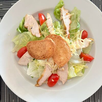 салат Цезарь в Трактир Распутинский по цене 170 ₽