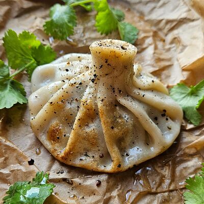 Хинкали с говядиной жареныев Сытый Гусь по цене 155 ₽